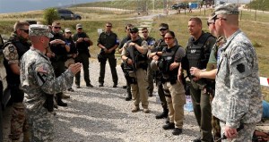 The Multinational Battle Group-East Military Provost Marshals office gives brief to NATO Forces Kosovo in Camp Bondsteel, Kosovo, July 26, 2016 EUCOM